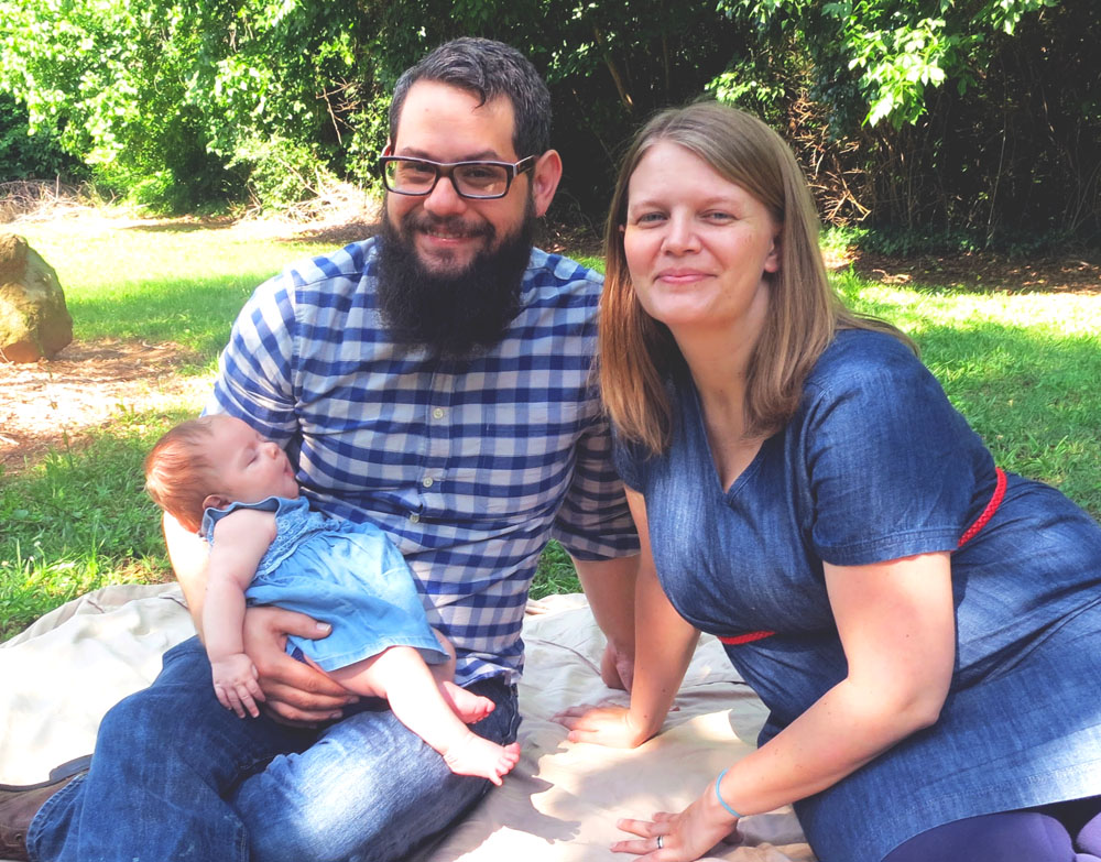 Tim Denson relaxes with his wife, Jenny, and their daughter, Sarah.
